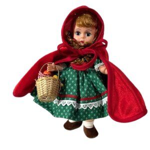 Madame Alexander restrung 8" Red Riding Hood doll with stand.